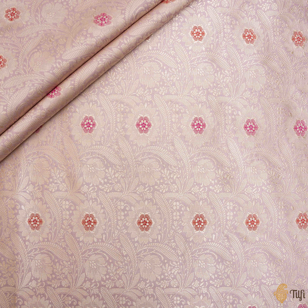 Close-up of floral zari jaal pattern on pink Katan silk Banarasi fabric