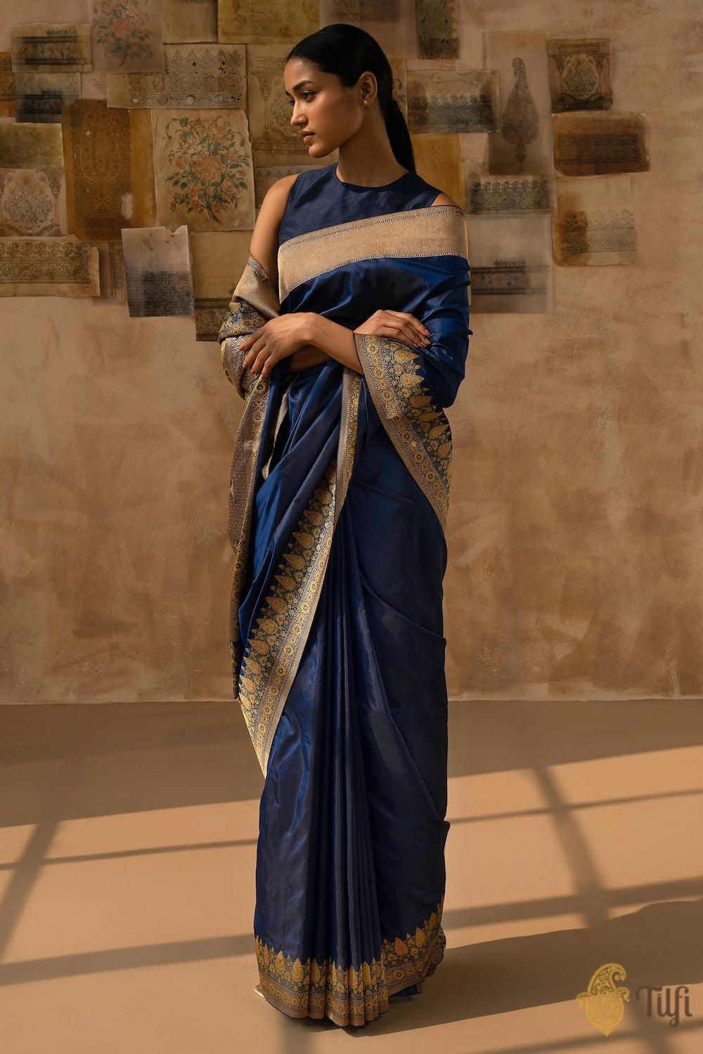 Close-up view of the Aamodini Midnight Blue Katan Silk Banarasi Saree showcasing intricate meenakari borders.