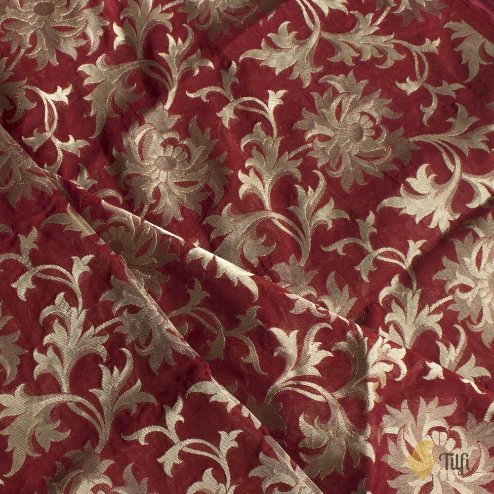 Maroon silk georgette fabric with zari and floral cutwork for elegant sarees