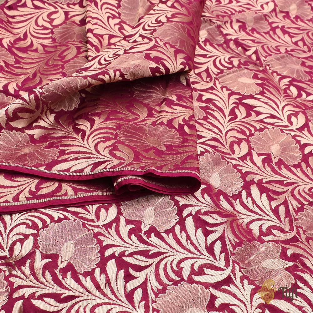Detailed view of deep pink Banarasi handloom fabric with zari work