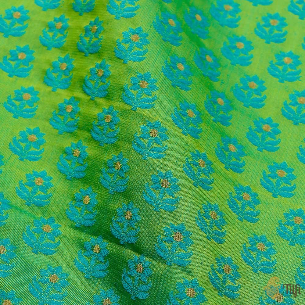 Green-blue Banarasi silk fabric with gold zari embroidery for sarees